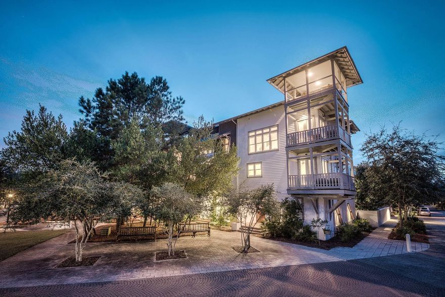 Overlooking St. Augustine Park in Rosemary Beach, this four-story attached home is a must see! Enjoy views of the green from every level with wrap around balconies on the second, third and fourth floors. Natural light flows throughout the home with its abundance of windows. Built in 2007 with a complete renovation in 2016, added dark wood floors are accented with gorgeous modern rustic fixtures. This home features a unique reverse floor plan with two bedrooms on the first floor and the master suite along with a third guest bedroom on the second floor, all equipped with private bathrooms and plenty of storage space. The master suite features a private balcony, small wet bar, double vanities, large soaking tub with treetop views and a custom tile shower. Take the private elevator to the