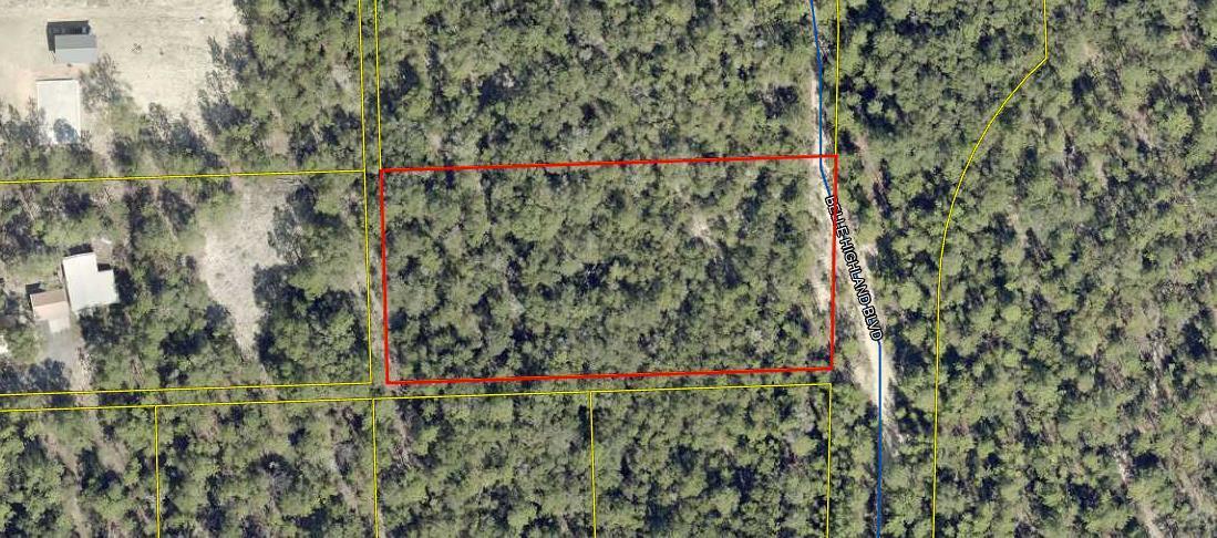 Very nice, high and dry residental lot.  Almost two acres, wooded in a plated subdivision.  There is a home owners association with annual dues.  Last two years the assessment was $15 per acre per year or $29.10 for this lot.  There is no sign on lot.