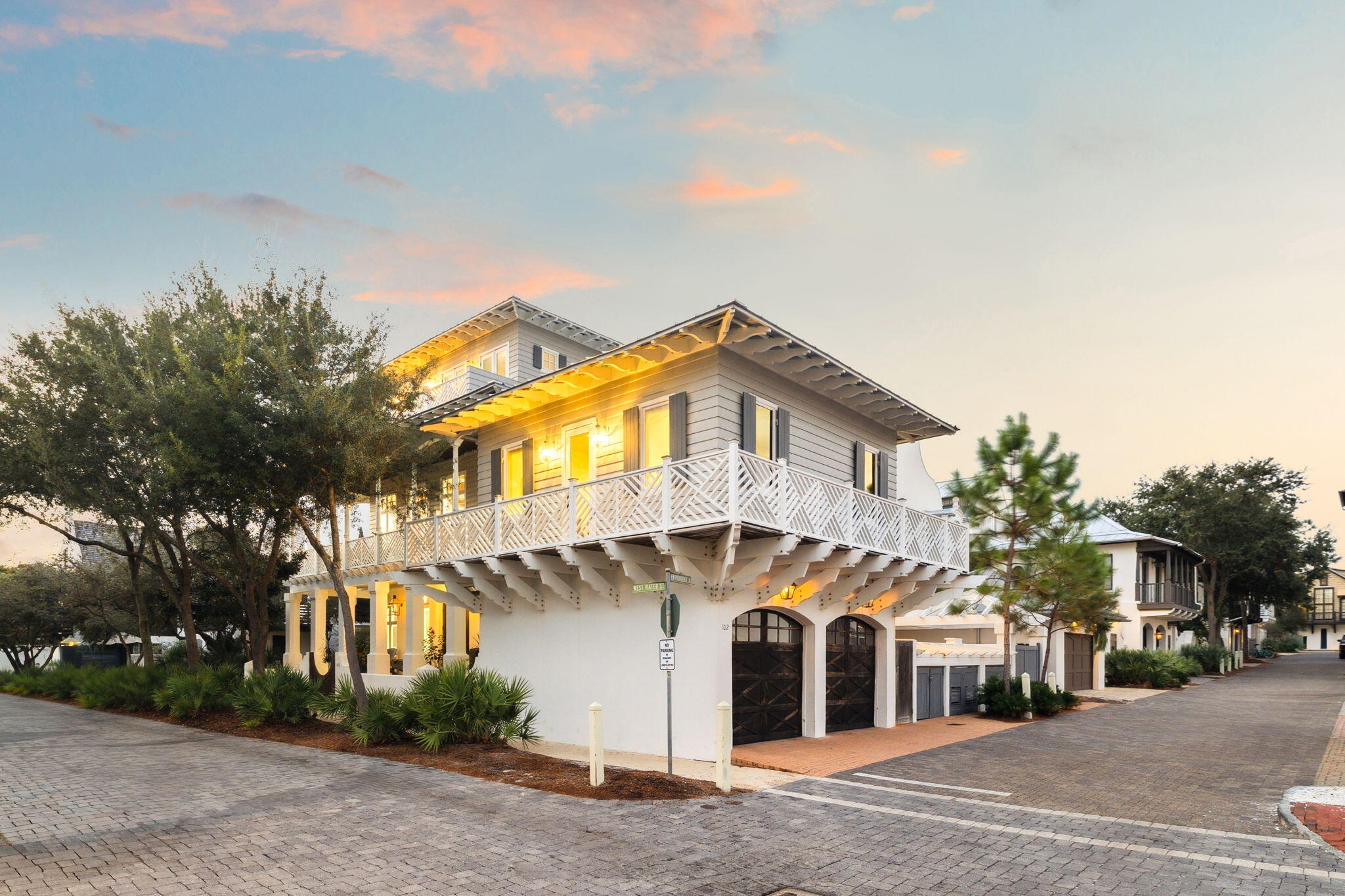 Welcome to 403 W Water Street, a rare opportunity to own one of Rosemary Beach's most remarkable residences. Located on the south side of 30A just steps from the beach and town center, this home enjoys a premier location on a prominent corner lot along the iconic Boardwalk to the H Beach Walkover. With 5 bedrooms, 6 baths, and 4,592 square feet and wonderful storage, it blends timeless architecture with modern luxury.The first floor features a living area, laundry room and three spacious bedrooms, each with private en-suite baths, providing a restful retreat for guests or family. The second floor is dedicated entirely to living, dining, and kitchen spaces, creating an open and light-filled setting for gathering and entertaining. A gas fireplace anchors the main living area, adding warmth and character to the expansive open floor plan. Upstairs, the entire third floor serves as the master suite. This private sanctuary is complete with a balcony, Gulf views, and luxurious finishes.
The home captivates with wrap-around porches that bring the beauty of Rosemary Beach indoors. The elevator ensures effortless access to all levels.
French doors open onto multiple outdoor living areas, and the heated pool and outdoor living area with grill is the centerpiece for relaxation. The carriage house and two-car garage add flexibility and convenience for guests or extended stays.
Beyond the home itself, you'll enjoy the best of Rosemary Beach just steps away. The Western Green, Town Center, and pristine beach access are right at your doorstep. The community's resort-style amenities, including four swimming pools, tennis courts, and a fitness center, further enhance the lifestyle this address affords.
Whether envisioned as a full-time residence, a refined coastal getaway, or a short-term luxury vacation rental, this home offers a rare combination of elegance, comfort, and a one of a kind location! Schedule your private showing today.