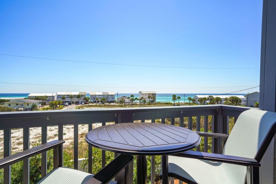 One block from the beach with amazing gulf views! This home features an elevator to all floors, private 1st floor fully-equipped apartment, private heated pool, heated/cooled 1.5 car garage, balconies on all levels, 2 kitchens, 4th floor tower, and hardwood flooring throughout. The 1st level apartment has a kitchen with everything you need including an ice machine, a full bath, french doors leading out to the pool area with built-in gas grill, and ample space to turn this into a game room or multi-bed bunk room. The 2nd floor is home to 2 Master Bedrooms, both with en suite baths and private balconies, and a Bunk Room with its own full bath. A 3rd Master Suite with private balcony can be found on the 3rd level, along with the main living areas. The oversized kitchen is outfitted with high-