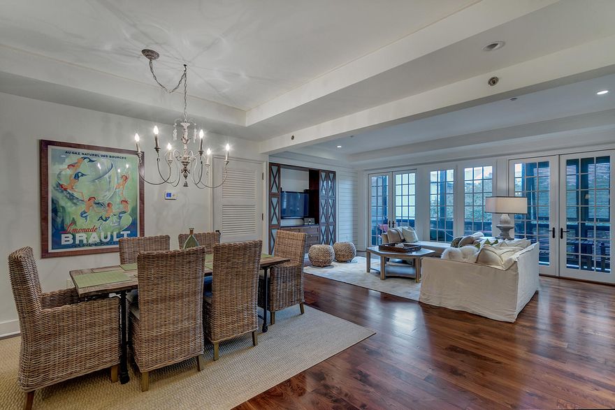 Elegant, one of a kind condominium in coveted Rosemary Beach. Newest condo development in Rosemary. Sit back on one of the 2 balconies overlooking Barrett Square and enjoy the ambiance of town. Listed as a 2 bedroom, but bonus room could easily be a 3rd bedroom or bunkroom. Beautiful Walnut hardwood floors throughout. Casual coastal furnishings with Viking stainless appliances in kitchen and white marble counter tops. Great location above Bambora Surf Shop and the Cottage Rental Company and just around the corner from Amavida Coffee Shop. Underground parking garage with elevator access and owner's storage cage. Rosemary Beach has 4 community pools and will soon feature a new amphitheater and owner's pool currently under construction. There are 9 beach walkovers and approximately 1/2 mile