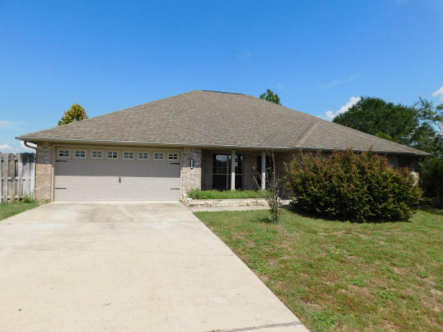 TONS OF POTENTIAL!!! This FIVE bedroom THREE bath home in Lee Farms is ready and waiting for your personal touch! Huge great room with wood burning fireplace features 9' ceilings. It is off the big kitchen with spacious eating area and Breakfast Bar/Pass thru. Master bath has double vanity and separate shower. Upstairs is a large bonus room perfect for so many uses!! The huge backyard is fenced and private. This home is close to all amenities! This property may qualify for seller financing. Don't miss out on this beautiful home at this price!