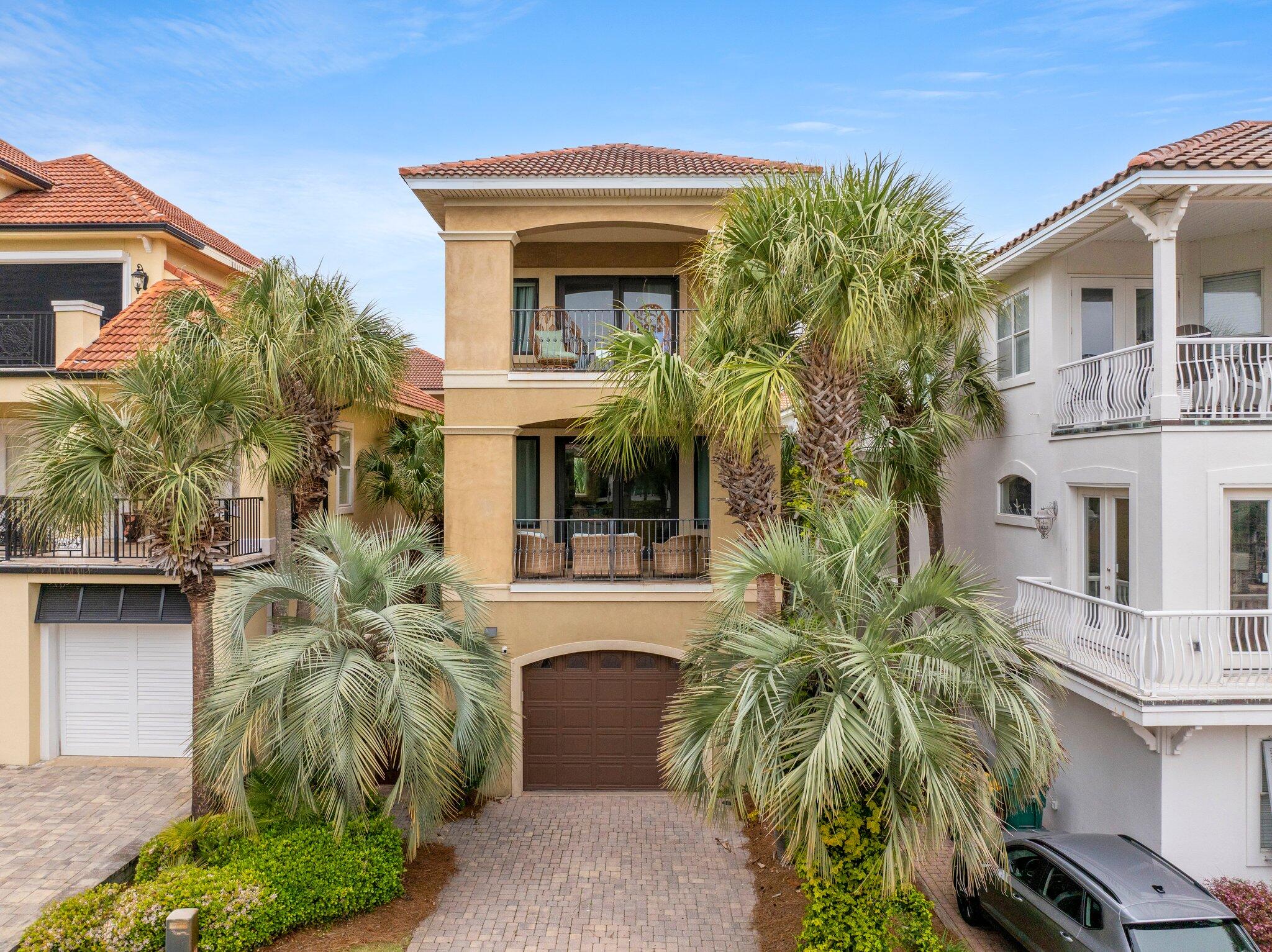 Welcome to this Professional Designed Short term rental doing well over $150k in gross revenue in Destiny by the Sea! This 4BR/5BA coastal retreat is just steps from private beach access and directly across from the community pool. With two master suites featuring spa-style baths, a gourmet kitchen, private office, and multiple balconies with Gulf views, it's ideal for families or professionals. All bedrooms include private en-suite baths, plus there's a sleeper sofa and extra full bath on the main level. The open-concept layout is perfect for entertaining, and the location offers walkable access to fine dining, golf, shopping, and top-rated schools. Includes a 1-car garage and driveway parking. Experience the best of Destin in this exceptional beachside home!