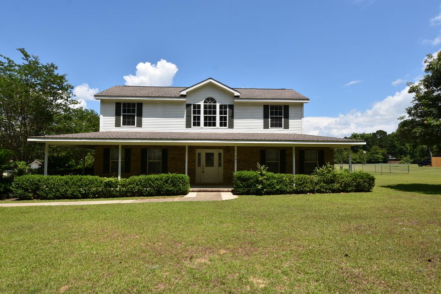 Country Home on 2 acres of level land in the popular Baker Community. 2x6 Construction with recent Renovations in 2018/2019 including New Roof in 2019. 12x16 Florida Rm accesses the covered patio and Carport, and has a doggie door to the chain link fenced area. FL Rm is NOT included in the SF. Open floor plan has excellent traffic flow. Master Bedroom arrangement is designed with handicap provisions: separate vanities and large tiled shower. Bonus Room off the Master Bath and Living Room would be a great place for a Nursery or Office. Formal Dining, Breakfast Bar and Breakfast Nook. Large Country Kitchen. You will love the large Laundry Room. Powder Room downstairs. Bedroom 2 and 3, Landing, and 2nd Full Bathroom upstairs. Large Barn has a covered area for your boat or yard equipment