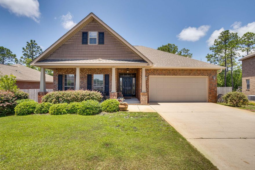 Enjoy this Craftsman Style, all brick exterior home on an over-sized lot in Peach Creek. Nestled in the desirable Pt. Washington area, this home has all the features you're looking for w/an open floor plan, vaulted ceilings, hardwood & tile flooring, granite counters and ceiling fans throughout. Great kitchen w/views into dining and living areas features plenty of granite counter space, custom wood cabinets, a breakfast bar, large pantry, kitchen niche + formal dining room and french doors to sun room w/views of rear deck. Spacious master bedroom w/en-suite bath, separate walk-in shower, dual vanities + Jacuzzi-style tub + trey ceilings. Split bedroom plan for ultimate privacy with 2 additional guest rooms + another full bath. Expansive fenced-in backyard