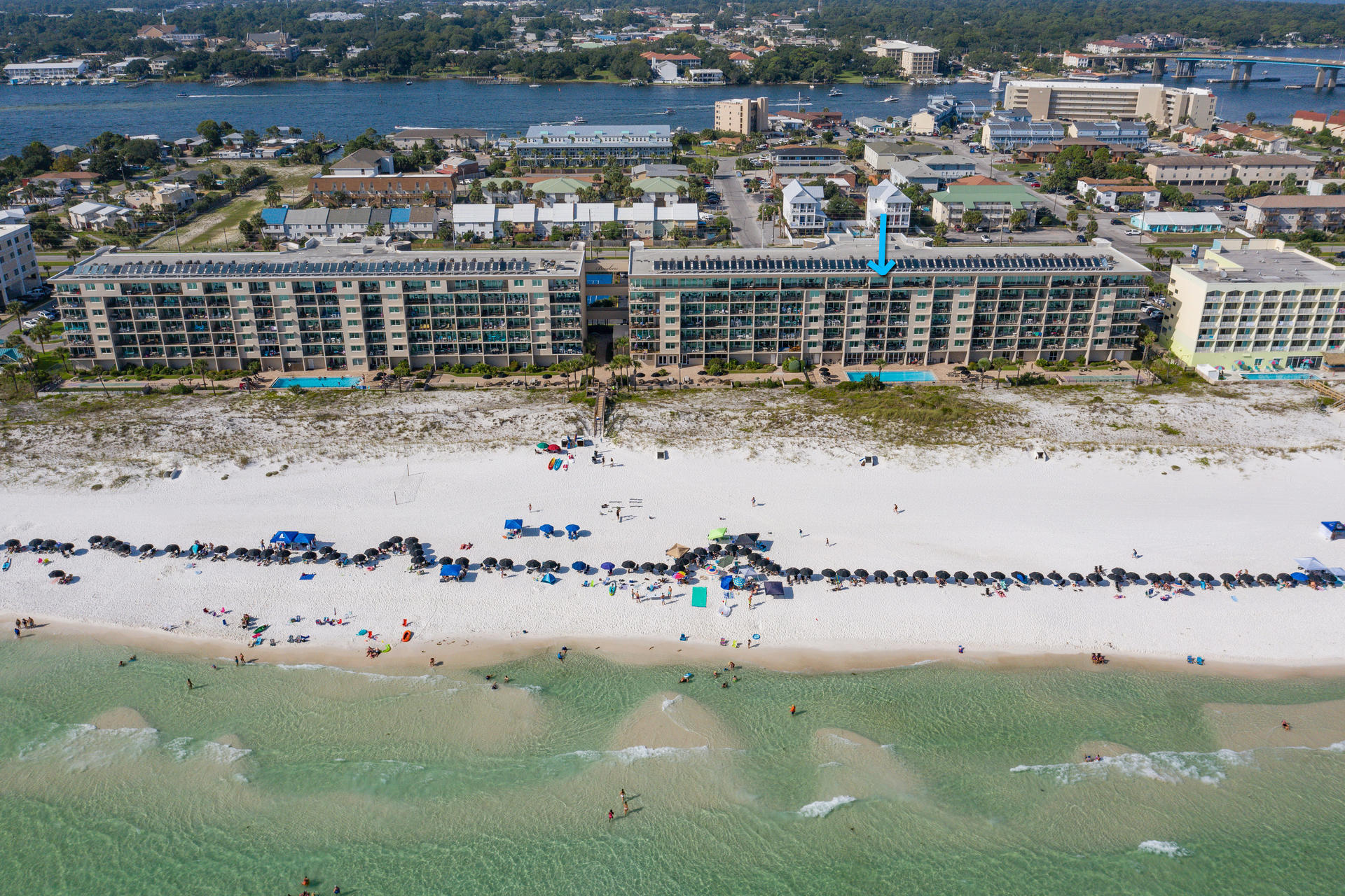 VA APPROVED! The rarest of the rare is here! The ONLY 1 bedroom-1 Bath at the greatly desired Breakers on Okaloosa Island! Take the elevator to the private-rental restricted-Top Floor for amazing gulf front views from the oversized balcony, large living area and the kitchen. Enjoy a breathtaking view of the two heated pools complete with separate kiddie pools for the kids. Your family will enjoy many years of the beach life along with the on site gym facilities, tennis courts, fully equipped community room. Take the boardwalk over the world famous emerald coast sand dunes to the sandy beaches and emerald waters. The unit features a Brand NEW HVAC and a very large separate/private storage room. A low monthly HOA fee of $357 pays for water, cable, internet + more!