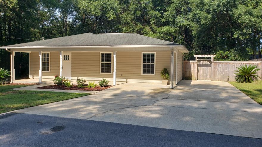 BACK ON MARKET ! NO FAULT OF THE SELLER. ~ Adorable, Very Clean ~ 2 bedroom / 2 bath home located conveniently close to town but with the privacy of living in the country. This gem is tucked away at the end of the street next to a wooded area. The home features an Open Floorplan, spacious living room, kitchen/dining room combination with good sized bedrooms **This home has a 2nd bedroom that is large enough to put 2 children's beds comfortably along with their dressers and toys ** Interior laundry room with built in cabinets for storage. Out back you can relax on the patio or enjoy the meticulous maintained yard. Plenty of shade trees to help keep you and the house cool during the summer. Yard building has power.