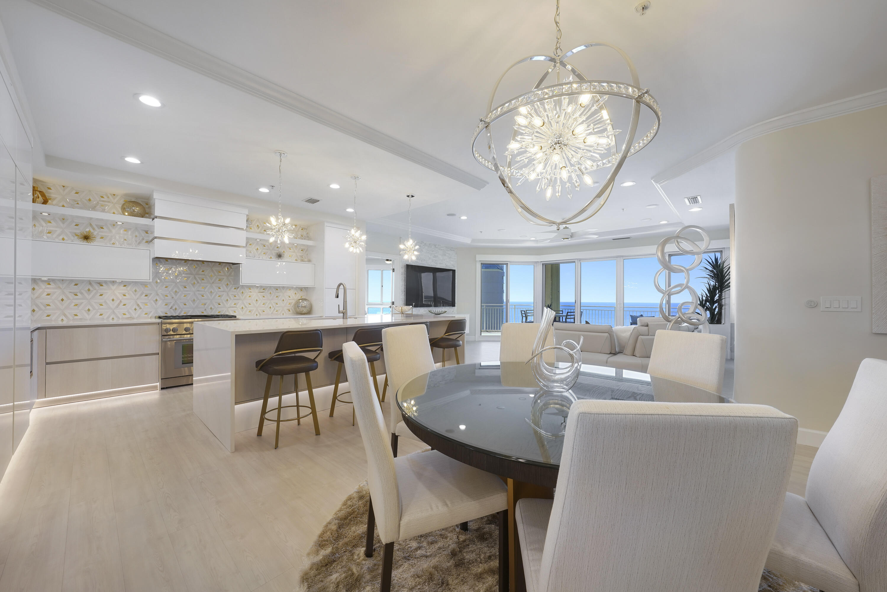 This absolutely gorgeous Villa is located on the 17th floor of Grand Dunes II overlooking the neighboring properties, which gives it the most incredible 180 degree views of the Gulf and sugar white sands of South Walton!!The owners have spent almost a year remodeling this beautiful Villa and it shows! From the moment you step off the semi-private elevator into your private foyer, you will immediately notice that there was no expense spared in this creation. The time and meticulous attention to every detail to create this Modern/Contemporary beauty is obvious! Everything in this unit is top of the line and brand new; from every fixture, to every appliance, every cabinet and every countertop! I promise, you have never seen another Villa like this one! Features of this incredible beauty include; "Oceanview" Luxury Vinyl Plank flooring throughout, "Silestone Eternal Calacatta Gold" polished quartz countertops, featuring a custom contemporary double waterfall island w/ a deep 18-gauge stainless steel "Franke Pescara" sink, "Thermador" appliances featuring a custom paneled double door fridge with 30" refrigerator and 30" freezer with GOLA handless system, 36" gas range with griddle, custom range hood, 30" microwave drawer, "Sapphire Series" built-in dishwasher with LED lighting and "U-Line" 15" Nugget Ice Machine. Other features include: custom cabinetry at it's finest, "American Made, Italian inspired"; this custom kitchen is finished in "Milano Collections Panna" finish and "White Lucido" high-gloss, featuring "GOLA" handless system; LED upper and lower cabinet lighting; touch-latch appliance panels and LED stainless steel Toe-Kick lighting. Custom built-in oversized pantry, Built-in coffee bar, automatic blinds in all rooms, "Samsung" 8K TV's; 85" in Living Area, 75" in Master and 65" in Guest bedroom and "Control 4" Home Automation System. Other features include: Floating "Milano Gola" bathroom vanities with an ultra luxe feel with LED strip lighting underneath, personalized linen cabinetry with custom built-in hamper, "TOTO" toilets in all bathrooms, Master bath has "Kohler" shower featuring DTV+, Kohler's most advanced showering system featuring a digital shower interface control panel. Master bath also features a "Seura" TV mirror and smoked glass door into the separate water closet. Laundry room features extra built-in cabinets and a laundry pantry for extra storage. AC features a new "ECOBEE 3" thermostat. Villa also has "Kalco" chandelier with Firenze crystal and matching pendant lights.
There are way too many features and upgrades to list them all, you simply must see this incredible Villa to truly appreciate all that it has to offer!
Grand Dunes offers: "Super Quiet Interiors", 24 hour security, gated entry, lush landscaping, 3 levels of gated underground parking for owners, grand lobby, semi-private elevators leading into your private foyer, private heated pool & hot tub, Owner's Lounge with Gulf front Fitness Room, Over-flow suites for guests, 200' of deeded beach, serene streams, majestic waterfall and a Lagoon Style Gulf front pool area with Hot Tub shared by both buildings and Beach Service.
Grand Dunes is the Emerald Coast's Most Desired Rental Restricted Beachfront Development!
Call us today to schedule your private viewing of this gorgeous Villa!