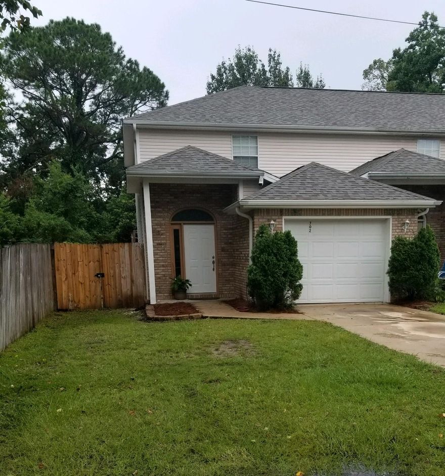 NO HOA!! NEW ROOF FEB 2018!! 1 CAR GARAGE!! END UNIT!! This townhome has a great location for fast and easy access to both Hurlburt and Eglin AFB. Upon entering, the raised foyer ceiling gives a light, open feel. Home features open concept living, which includes kitchen with breakfast bar, designated dining area, and spacious living room. Upstairs has two large bedrooms with double closets and private baths. The half bath downstairs is convenient and houses the laundry room. New sliding glass doors lead to a large, privacy fenced backyard with an oversized patio, including a fire pit and plenty of space to BBQ and entertain. Other home features are a whole house water filtration, alarm system & garage door opener. Make an appt. today! Buyer to verify all pertinent information.