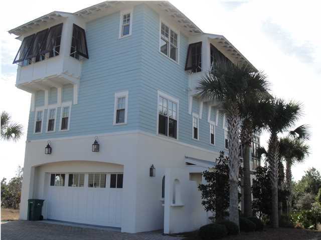 Amazing Gulf views from this immaculate, never rented, three story beach home located in the exclusive gated community of Cypress Dunes. This is a top quality John Willis home featuring superior construction with wide oak plank flooring throughout,stainless steel appliances, limestone counter tops and custom cabinetry. The island kitchen /breakfast bar features a wine refrigerator and ice maker. All three levels can be accessed using the elevator or wide hard wood staircase. The third floor kitchen, dining and living area features wood paneled walls and is the ideal space for entertaining family and guests with it's spectacular Gulf views from the expansive balcony. The second floor features a large master suite with its own balcony. There are also two other bedrooms on this level