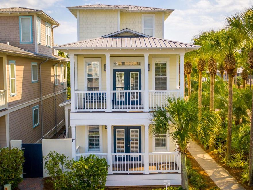 Offering an ideal 30A location just steps from the beach, this well-maintained coastal home is an ideal opportunity for those looking for a vacation retreat or turnkey investment property. This home welcomes you from the moment you arrive with its sunny yellow exterior and porches on two levels.The home has been immaculately maintained and features several recent upgrades from fresh coats of paint and professional cleanings to an outdoor shower addition and updated furnishings. A spacious master suite with a private bath and an additional bedroom are located on the first floor along with hallway bunks and a full bath. The second level features bright open-concept living spaces with high ceilings, hardwood floors, and an abundance of natural light.