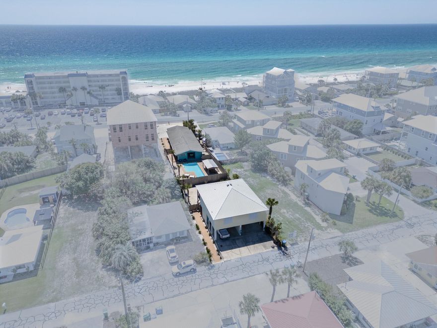 Gulf-View Investment Property w/ Multiple Rental Units & Redevelopment Potential - A rare investment opportunity on FBR This oversized 50x235 ft lot offers stunning Gulf views, direct public beach access, and multiple income-generating rental units, making it perfect for investors or those looking to build a dream beachfront estate. - Renovated Beach Cottage 4 bd, 3 bth, fully updated, an ideal VR or primary residence. Updated Duplex- each unit w/ 2 bd, 2 bth, covered parking. Seller willing to split w/county approval, setback req. 1.5M Cottage, 850k Duplex(s)