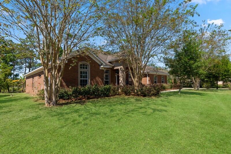 Charming one story 4 bedroom, 3 bath home with an additional office/flex space situated on a large lot with a stunning screened porch to enjoy your morning coffee or late afternoon BBQ. Kitchen provides plenty of cabinets with a breakfast bar, corian countertops and opens to the large family room with cozy gas fireplace. Separate dining area awaits for those big family gatherings! Extensive Crown molding throughout, spectacular trim work, gorgeous built in bookcases and wainscoting featured in Dining Room. Windswept Estates is a 750 Acre master-planned community with a premier golf course! Amenities include swimming pool, clubhouse, two tennis courts, basketball courts, and a playground! A quick 15 minute drive to the beautiful beaches of the Emerald Coast! Welcome Home!!!