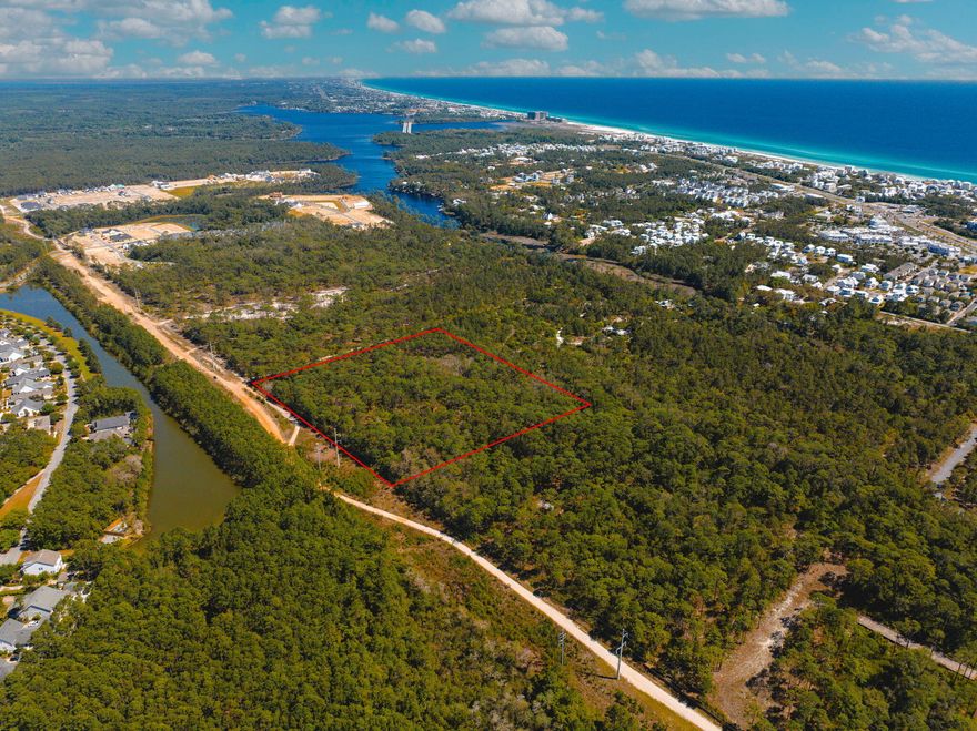 This unique 10+ acre property sits in a prime location within Inlet Beach, close to the newest phase of the WaterSound Origins community. Just steps from the serene waters of Lake Powell and a quick drive to some of the Gulf Coast's most beautiful beaches, the setting offers the perfect blend of peaceful nature and convenient access. The property is zoned Conservation Residential, allowing for up to two homes per acre, offering both space and flexibility for future development. You're moments from the boutiques, restaurants, and vibrant energy of 30A hotspots like Rosemary Beach, Alys Beach, Seacrest, Inlet Beach, and 30Avenue. Whether you're drawn to the scenic beauty, the lifestyle, or the potential to build, this parcel is ideally positioned in one of Northwest Florida's fastest growing and most desirable areas, right between the laid-back charm of 30A and the vibrant activity of Panama City Beach and Destin.