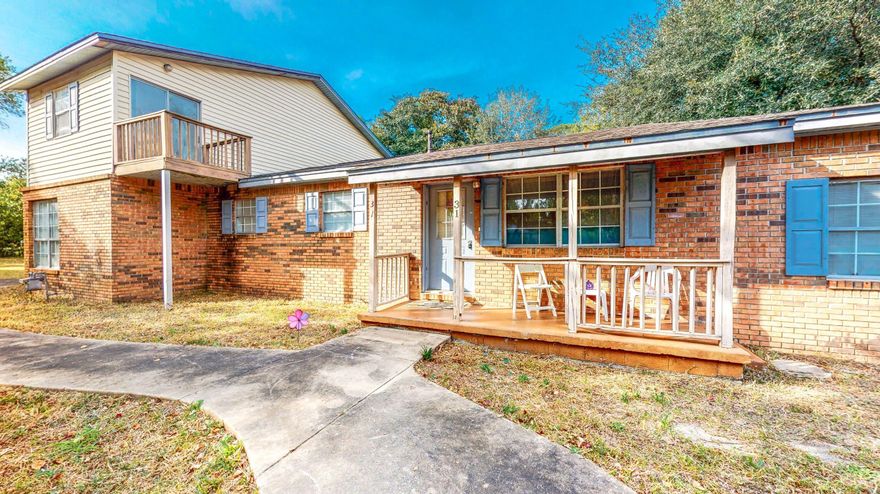 Located in Opportunity Zone! VA Renovation loan eligible! With plenty of room both inside and out, this 2 story is makeover-ready. Very livable in its current condition; will qualify for conventional financing only and priced accordingly. Downstairs has master suite + 3 bedrooms/2 baths, an addtl small office, open kitchen/living and den with fireplace and a utility room. Upstairs has a kitchen, den and 1 bed/1 bath. Current layout would work well for someone to live upstairs relatively independently from the rest of the house in their own ''apartment.'' Large fenced yard and storage building too. It is possible you might be able to split the side vacant lot from the house but should be verified by buyer.