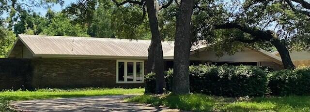 Full Brick, metal roof, upgraded windows.