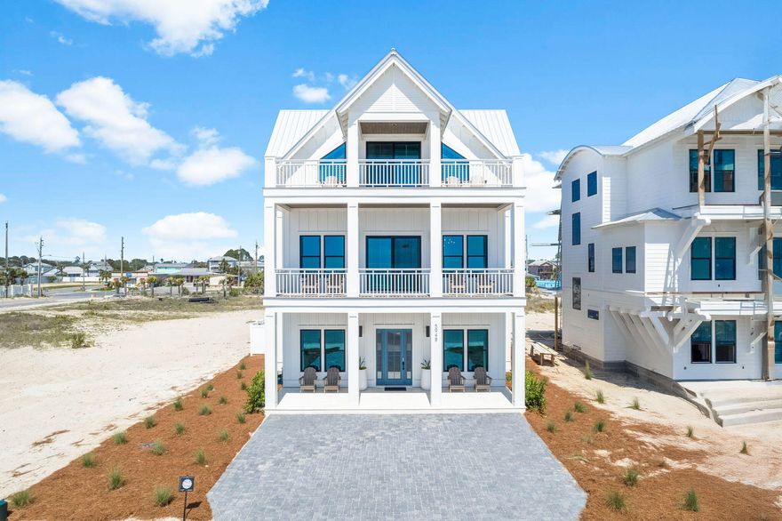 Under contract with 72 hour kick out clause in place. Positioned just steps from sugar-white sands and turquoise waters, 5948 Gulf Drive presents an elevated coastal residence within the refined setting of Hadley's Beach. With six bedrooms, six and a half bathrooms, and captivating Gulf views, this home offers a seamless blend of architectural detail, thoughtful design, and effortless seaside living. Interiors are curated with designer finishes and anchored by a chef's kitchen appointed with premium appliances, creating a sophisticated yet inviting environment for gathering and entertaining. Open living spaces are filled with natural light, framing coastal vistas and reinforcing the home's connection to its surroundings.

Private retreats are thoughtfully arranged, including a spacious bunk room that enhances flexibility and functionality. Each bedroom suite is designed for comfort and privacy, supporting both everyday living and extended stays.

Outdoors, a fenced backyard surrounds a private pool, offering a tranquil setting for relaxation after days spent at the beach just moments away. Whether enjoying sunrise walks along the shore or evenings under the stars, the lifestyle here is defined by proximity, beauty, and ease.

With short-term rentals permitted and a premier Gulf-side location, 5948 Gulf Drive pairs lifestyle appeal with long-term opportunity. Refined, composed, and richly connected to its setting, this residence embodies the enduring elegance of coastal living at its finest.