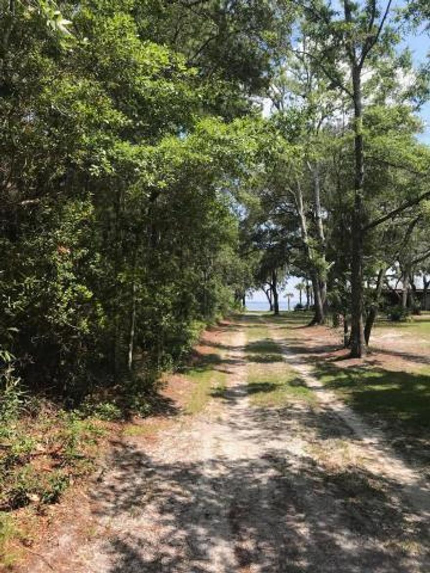 This great lot is oversized and would make the perfect home-site for boaters and anglers.  This 150 x 180 residential lot with hardwood trees has deeded access to the Choctawhatchee Bay. The lot is on Smith Rd which is a private dead-end road.  Beautiful homes are going up all around the area. It is close to schools, government buildings and all the activities and attractions offered by South Walton. Septic tank and well will be needed. All information should be verified if important.