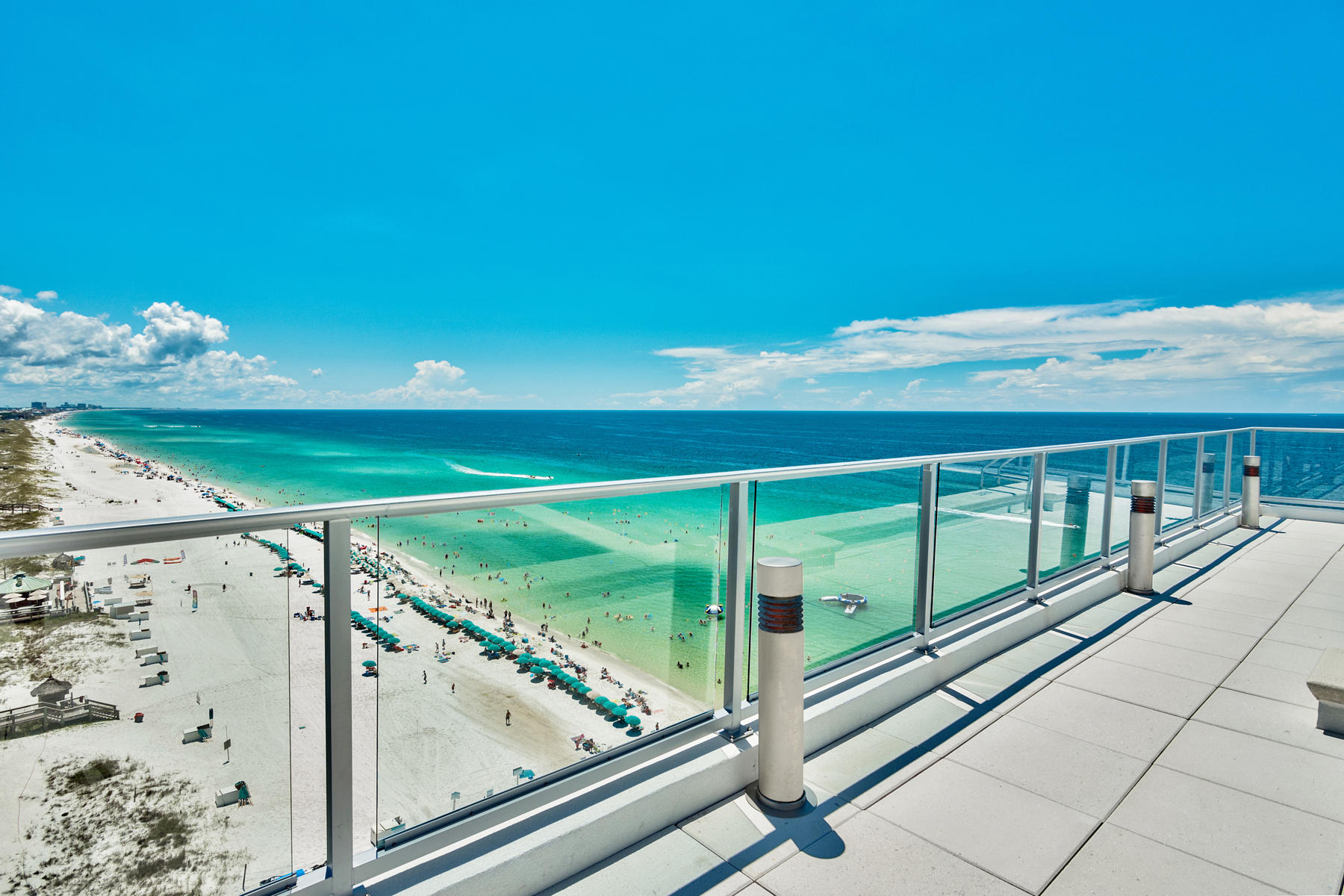 1900 Ninety Eight is Destin, Florida's first Gulf front condominium developed since 2007. Each exquisitely designed luxury residence features a panoramic view of the Gulf of Mexico from its private, 12-foot deep balcony equipped with an electric grill. The open plan with clean, flowing lines invites beams of natural light inside through an expansive wall of windows. Interior design elements that include custom cabinetry, marble and quartz countertops, Thermador kitchen appliances and porcelain stone floor tile makes this three bedroom, three bath residence truly incredible. Amenities include a rooftop pool, spa, fire pit & state of the art fitness center, along with gated entry, heated and cooled elevator and lobby areas and two levels of parking beneath the residences.