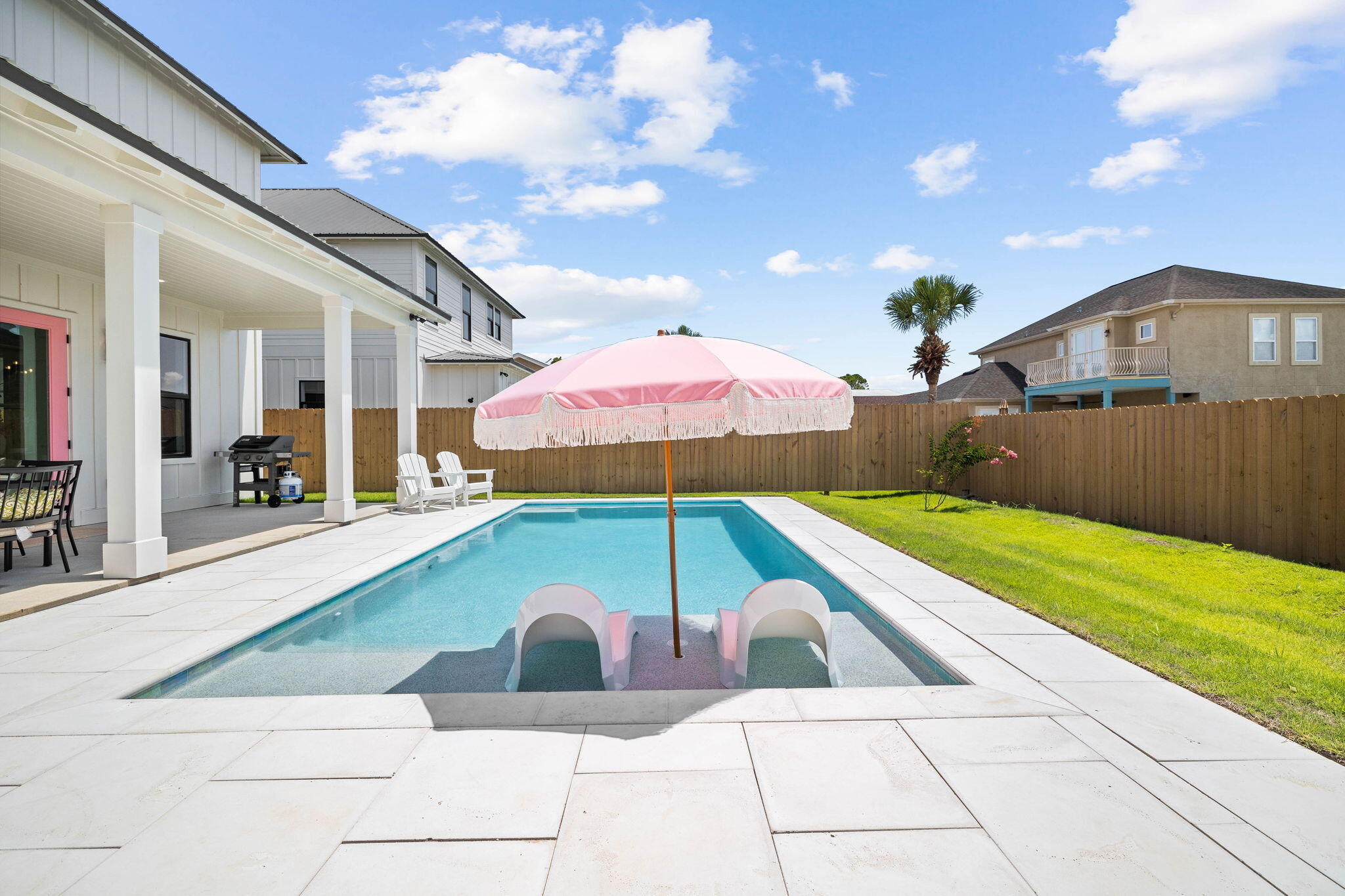 This stunning dream home has been custom built to host an extraordinary experience at the beach. Conveying fully-furnished, this exceptional getaway can be a lucrative investment property with gross rental projections at $135K and cash on cash return projections at nearly 6.8% annually. Located only six minutes from 30A, this property presents a wonderful floor plan with four bedrooms all having their own ensuite bathroom. This beautifully designed home flaunts a huge private pool, covered back porch & deep garage. The meticulously curated interior has wood-look flooring, large windows, tall ceilings and fabulous finishes. The well-appointed chef's kitchen provides the perfect gathering space on the first level. Enjoy a wonderful meal after a long day at the beach in the delightful dining area or dine alfresco on the covered porch by the pool. This home is offered fully-furnished and rental-ready. Inquire to receive rental income information and estimated expenses for this dream escape by the beach!