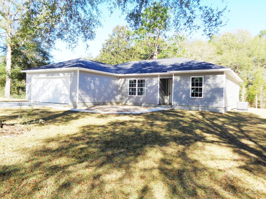 THIS NEW CUSTOM BUILT HOME HAS ALL THAT YOU ARE LOOKING FOR IN A HOME. 4 BEDROOMS 2 BATH SPLIT FLOOR PLAN WITH ALL THE EXTRAS. HOME WELCOMES YOU WITH A LARGE FOYER INTO THE LIVING ROOM THAT IS PERFECT FOR FAMILY AND GUEST ALIKE. KITCHEN HAS AMAZING CABINETS WITH PLENTY OF SPACE AND IS ATTACHED TO THE DINING ROOM. MASTER SUITE OFFERS A LARGE BEDROOM WITH TREY CEILINGS, A GREAT MASTER BATH TO INCLUDE A HUGE WALK IN CLOSET. THE 3 ADDITIONAL BEDROOMS ARE PERFECT FOR YOUR FAMILY. HOME HAS CUSTOM CABINETS, LUXURY VINYL PLANK FLOORS, TOP GRADE APPLIANCES MINUS A REFRIGERATOR, OPEN CONCEPT AND LOCATED JUST MINUTES TO JUNIPER LAKE BOAT LAUNCH GREAT BUY IN THIS MARKET.