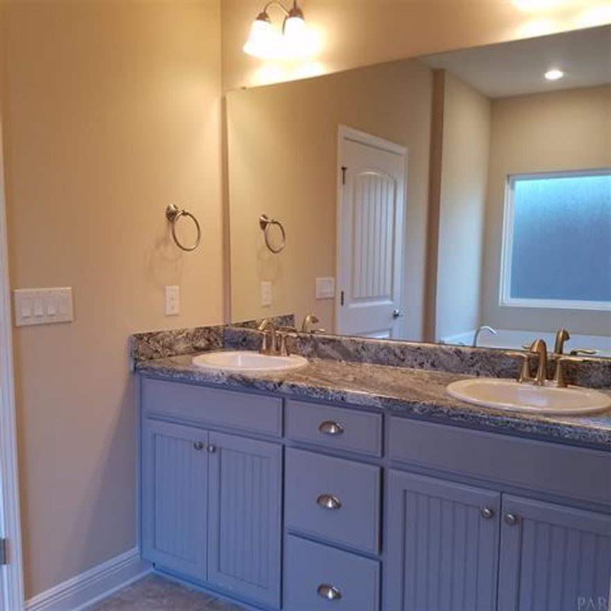 This 2624 sq ft beauty is a 2 story featuring 5 beds and 3 full baths.The 5th bedroom is alone on the second floor with its own bath and shares the second floor with a bonus room!There is also a very large storage room off the bonus room.The home is updated with core tec pro plus flooring throughout and carpet in bedrooms. Other upgrades include granite countertops in the kitchen and a 14x 16 back covered porch.This home is craftsman elevation and all brick! The exterior is fully sodded and professionally landscaped with sprinkler systems . All this on a nice flat lot!