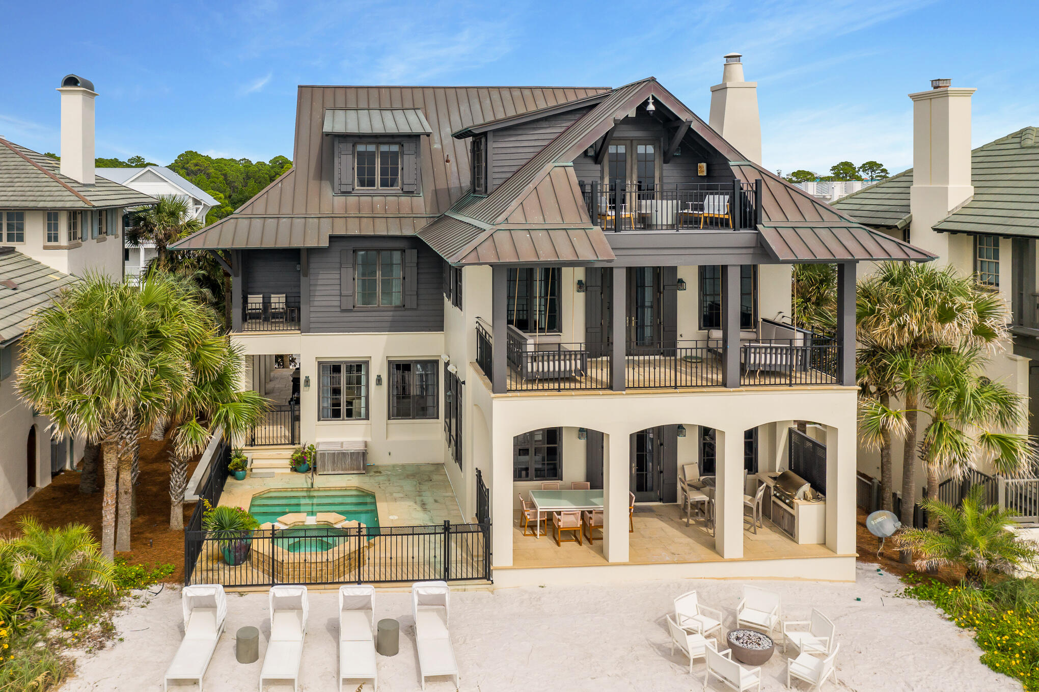 This incredible Gulf-front residence designed by architect Dawn Thurber and built by John Willis Homes has just been updated with new interior and exterior furniture curated by Harrison Design Atlanta - Karen Ferguson, ''Southeast residential Designer of the Year.'' Located front and center within The Retreat, it is only two lots to the east of the redesigned Gulf-front Beach Club, which features an infinity edge pool and private beach access and will open Memorial Weekend 2022. Very few homes have four complete levels of living space and even fewer have a Gulf Front outdoor entertaining area with unobstructed views of the beach...this home has it all! Entering the home through the second-floor main entrance, your attention is immediately drawn to the rear of the home