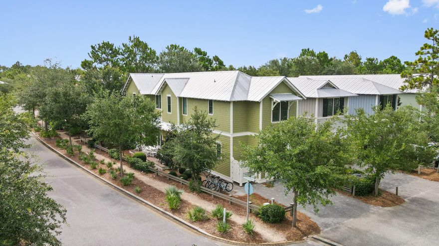 Whether you're looking for a fabulous vacation home to enjoy or a quality investment within Santa Rosa's coveted WaterColor community, this one might check off all the boxes on your wishlist! With an expansive floor plan, this 5-bedroom, 4.5-bath haven has multiple gathering areas ideal for entertaining guests. As you step inside, discover a bright, inviting interior with an open layout that keeps everyone connected. Large windows usher in soft sunlight throughout, creating a warm and welcoming atmosphere across the well-sized living room and adjacent dining area that comfortably seats six. Whip up your signature dishes in the gourmet kitchen with stainless steel appliances, ample cabinetry, granite countertops, and a pendant-lit island with additional seati