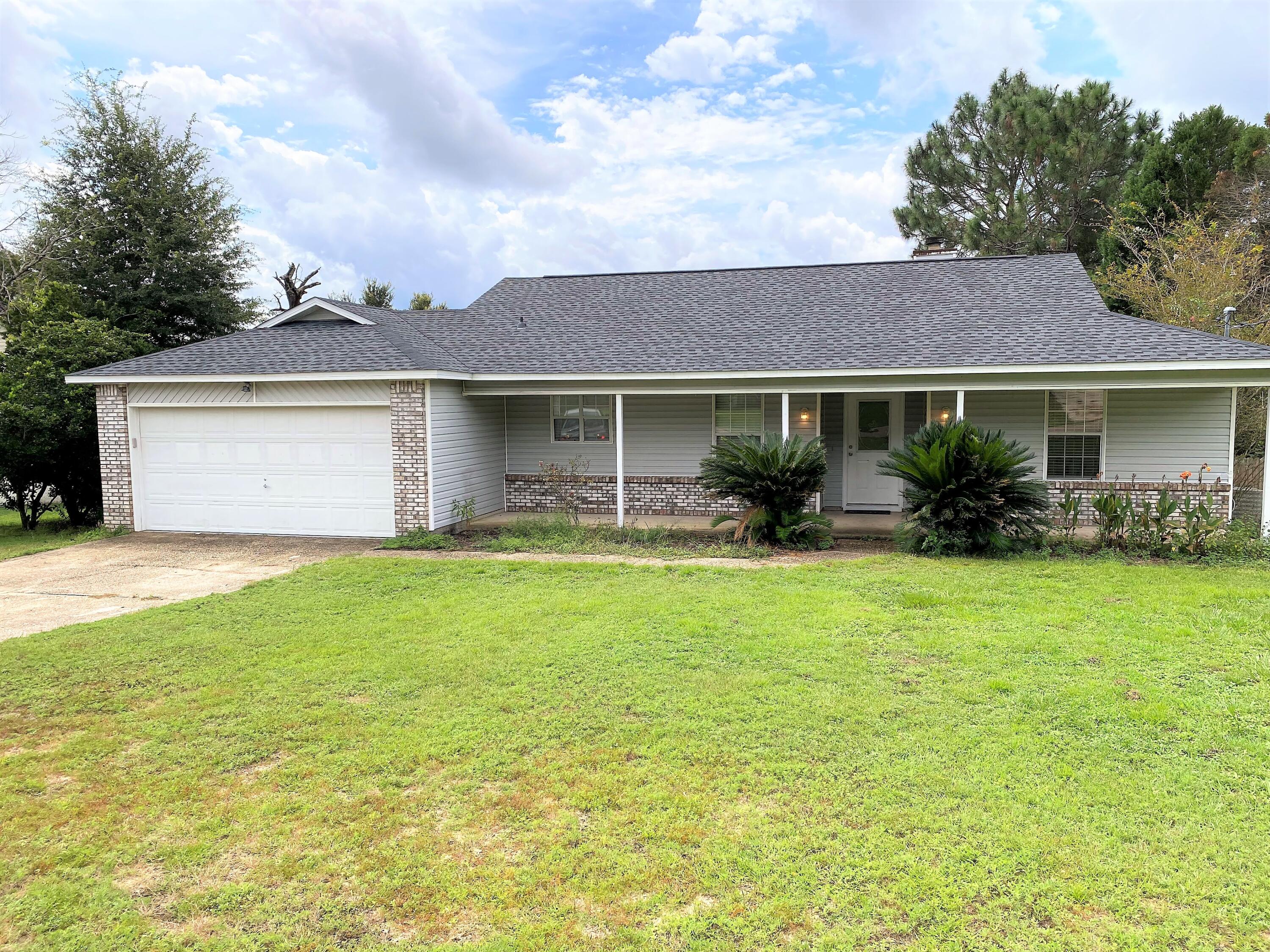 Welcome to this beautiful home in the desirable location, South Crestview! This home has a new roof and water heater less than 1 year old, a large living room with an additional large room off the back of the home that could have many uses - extra living area, play room, game room, office... so many possibilities! In this home you'll find a split bedroom floor plan with a spacious deck out back and a fully fenced in large backyard! Call the listing agent or your favorite real estate agent to schedule a showing!
