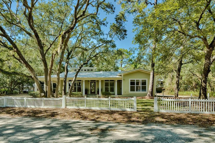 One of the rarest of finds in South Walton, a custom designed cottage in historic Grayton Beach. This one of a kind property encompasses almost an acre of land with majestic moss covered oaks that let you know it is a special property the moment you see it. Located on Grayton Trails Road, one of the best kept secrets on 30A; the main home offers 3 bedrooms plus an office and a 2 car garage. Additionally, there is a newly built (2016) carriage house with 2 car garage, full kitchen, living area and separate bedroom. This property would be a delightful rental, family retreat or full time home for generations to come. Call today to see a true hidden gem in wonderful Grayton Beach Florida.