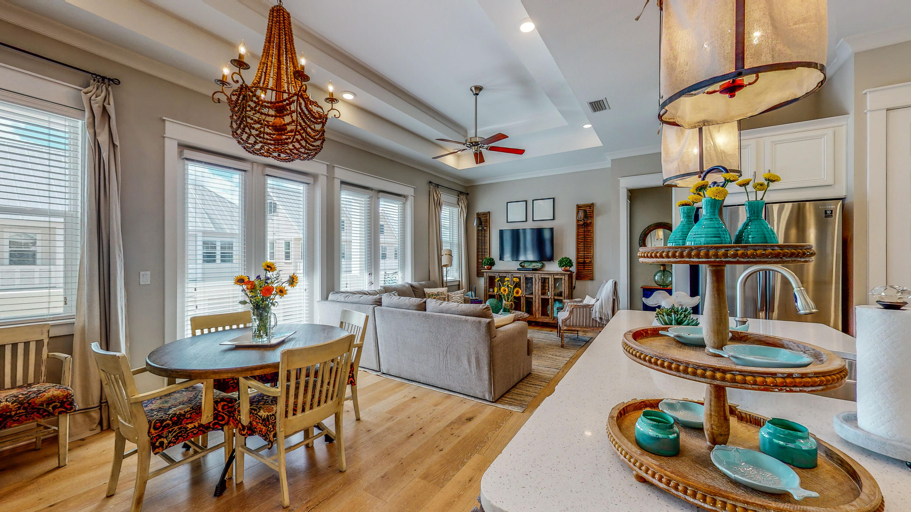 Boho chic meets emerald coast living in this beautifully decorated, Aruba floor plan, within the community of Prominence. Ideally located 2.5 miles West of Rosemary Beach, 7.2 miles East of Seaside and DIRECTLY across the street from the HUB-30A which offers live music, restaurants, shopping, and events! So, kick off your shoes and hang your clothes.. there is nothing left to do to this amazing triplex. Owners have custom lighting, hardwood floors (no carpet), replaced the refrigerator in August, updated barn door in guest room, window treatments throughout, and much more. Short Term Rentals and pets are allowed!