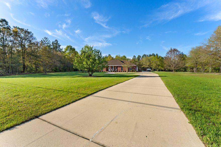 You don't want to miss this GORGEOUS Brick home on 2 acres in Crestview!!This home features a large open floor plan living and dining area with a breakfast nook that connects to a spacious kitchen with plenty of storage and a walk-in pantry. Take a step into the expansive primary bedroom with an en suite that contains double vanities and a walk-in shower. There are also three additional bedrooms and two full bathrooms. Enjoy the endless backyard and its pristine lawn! There is plenty of room for guests or a large family.