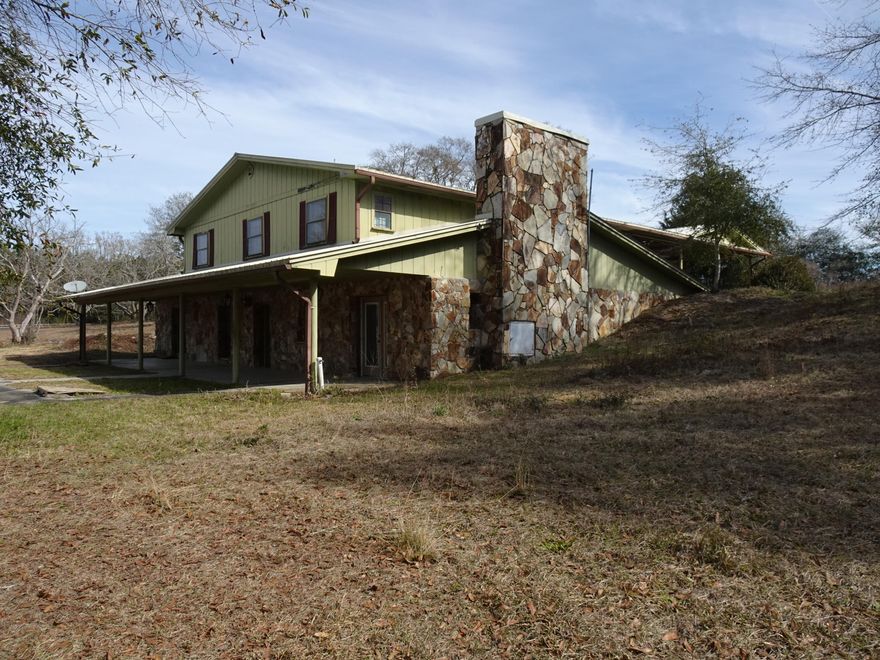 CASH ONLY SALE! . UNIQUE OPPORTUNITY TO PURCHASE A VERY LARGE HOME ON 12 ACRES WITH POND. HOME OFFERS 2 MASTER SUITES WITH LARGE BATHROOMS, ENORMOUS CLOSETS, AND AMAZING MASTER BATHS. UPSTAIRS ON THE FIRST LEVEL YOU WILL FIND 4 BEDROOMS TO INCLUDE ONE MASTER SUITE. THE SECOND (BOTTOM) LEVEL OF THE HOME OFFERS YOU THE OPPORTUNITY TO FINISH THE REMODEL TO YOUR TASTE AND LIKINGS. HOME OFFERS A HOME OFFICE, LARGE CELLER/PANTRY/LAUNDRY ROOM, A SECOND MASTER SUITE, THE KITCHEN, DINING AND LIVING ROOM. THE BOTTOM LEVEL OPENS TO A LARGE OPEN PORCH THAT LOOKS OVER POND PERFECT FOR AFTERNOON ENTERTAINING AND FAMILY GATHERINGS. HOME INCLUDES 2 STORAGE BUILDINGS, AND 1 CONCRETE BLOCK WORKSHOP. HOME WILL NOT QUALIFY FOR FINIANCING LOANS. HOME SOLD AS IS
