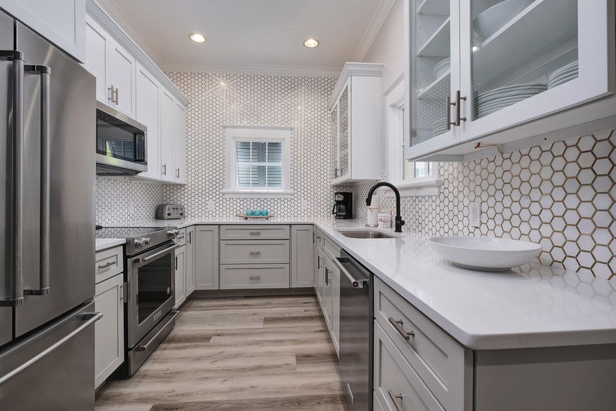 This 2 bedroom 2 bathroom plus bunk room Watercolor Town Center condo overlooking 30A located in the heart of Watercolor is just a short stroll to the Watercolor Beach Club, the boat house on Western Lake, Cerulean Park and all of the Watercolor shops and restaurants. This exquisite beach condo is a great fit for someone looking for a low maintenance rental property or a beach home! This unit was recently completely renovated to include shiplap walls, new flooring, new kitchen appliances, new cabinets, new countertops, counter to ceiling tile in the kitchen, high end light and plumbing fixtures, furniture, decor and more. This unit is one level and located on the second floor of the condo building and can be accessed via stairs or the elevator. The dining area opens to the living area