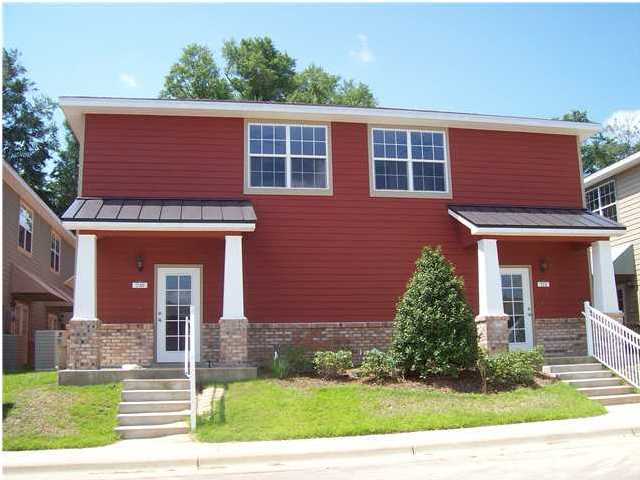 Beautiful town home community! Arbor Lake is quietly tucked away from the hustle and bustle of traffic, yet centrally located to the downtown center, restaurants, schools and shopping. Downstairs you will find plank flooring and carpet. A spacious half bath to include a laundry area behind bi-fold doors. The kitchen is top of the line, stainless steel appliances with granite counter tops, including a large breakfast bar, and plenty of storage in your cherry wood cabinets. The pantry also holds custom made shelving.French doors are located in the living room that lead to a patio for your cookout gear.Upstairs you will find two bedrooms each equipped with their own private bathrooms as well as walk-in closets. An additional linen closet is located in the hall for extra storage. A