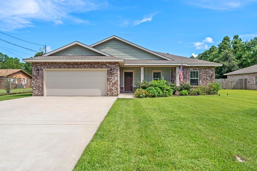 Exceptional newer home located in a prime east Navarre location with many upgrades throughout. Ramsey & Walker built in 2019. Clad with the timeless durability of brick, cement fiber board accents, and an architectural shingled roof.  Interior offers luxury vinyl plank flooring in the common areas, visually pleasing neutral tile in the baths and laundry room, and carpet in the bedrooms. Custom paint color is accented with a wide baseboard, beautiful crown molding, and spectacular tray ceiling accents in the master bedroom, dining and entry area. Transom windows over the hall entryways provide a high end custom touch. Stainless steel appliances including refrigerator, stunning shaker style cabinets, and granite throughout finish the home exquisitely. Open floor plan with kitchen island