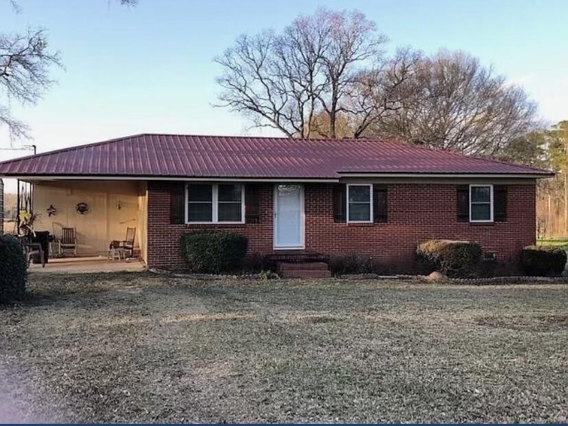 $15,000 Price drop! Motivated seller! Charming 3 bedroom 1 bathroom home located in the quiet Leonia community at 1280 Morrison Rd, Westville Fl 32464, just minutes from the Alabama state line.Situated on a spacious 1 acre lot, this property features a durable Metal Roof installed in 2020, brand new HVAC system 2024, and new windows throughout. The kitchen boasts newly installed appliances and the large outdoor area offers endless possibilities for gardening, recreation or potential expansion. Perfect for those seeking privacy and comfort in a serene setting while enjoying convenient proximity to both Florida and Alabama amenities.