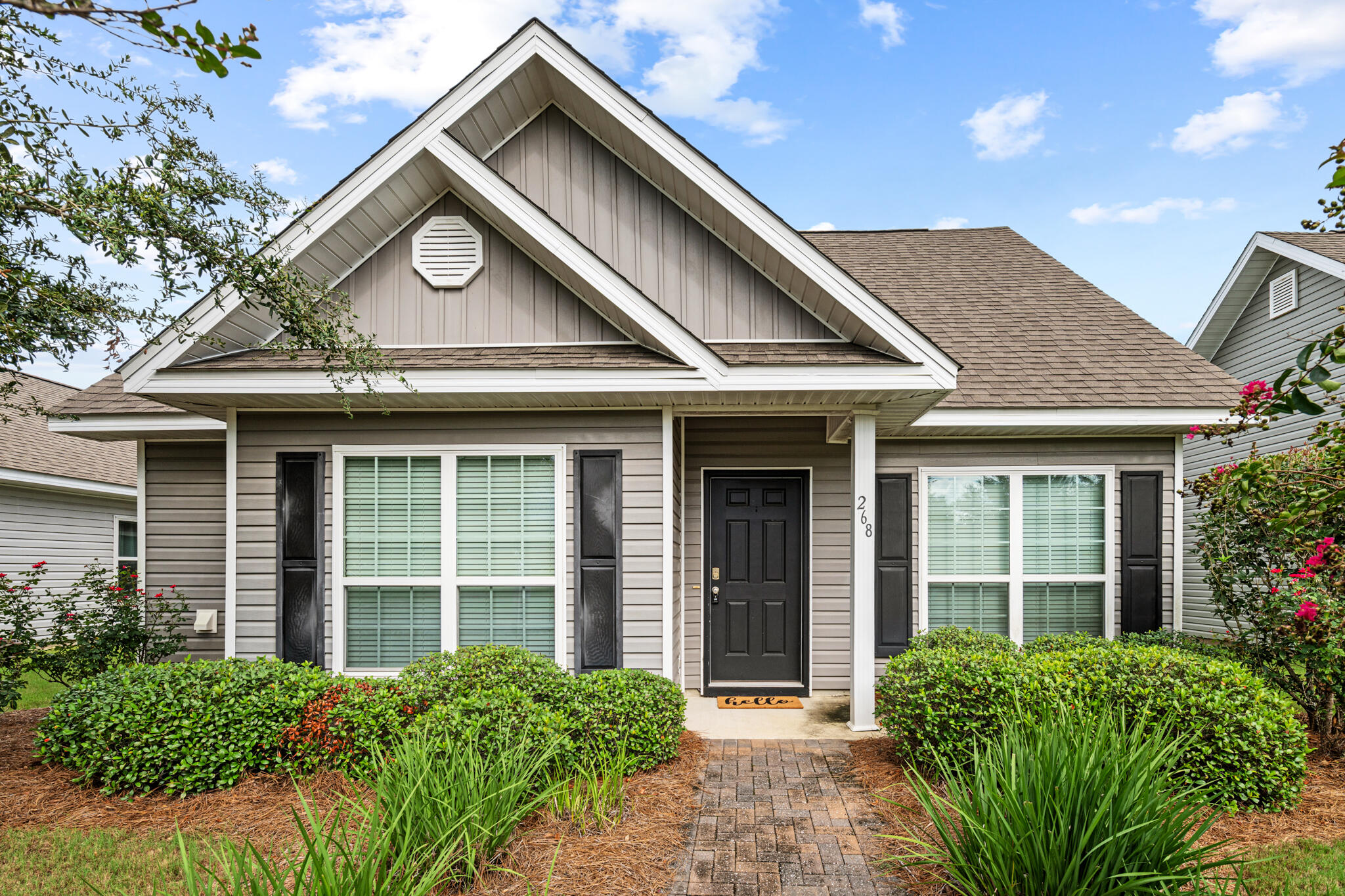 This adorable Florida Cottage style home in Hammock Bay features 3bedrooms and 2 bathrooms and sits across the street from Central Park and 1 minute away from all of Hammock Bay's amazing amenities. As you walk inside, you'll appreciate the open floor plan. The kitchen has a sit down counter bar and there's a separate dining area a window that overlooks the park. There are 2 bedrooms towards the front of the home and the Master Bedroom is towards the back of the home. The Master Bath features a walk in shower, a soaking tub, double vanities and walk-in closet. This property is low maintenance as the yard is maintained, fertilized, and mulched by the HOA.