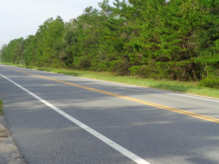 LOACTED IN GROWING MOSSY HEAD - THIS 6.4 ACRE PARCEL IS LOCATED JUST NORTH OF HWY 90 AND JUST MINUTES TO INTERSTATE 10 EXCHANGE AS WELL AS THE NEW INDUSTRIAL PARK. PROPERTY APPEARS TO BE VERY LEVEL AND A PERFECT PLACE TO BUILD YOUR NEW DREAM HOME. MOSSY HEAD WATER IS AVAILABLE. PAVED ROAD FRONTAGE