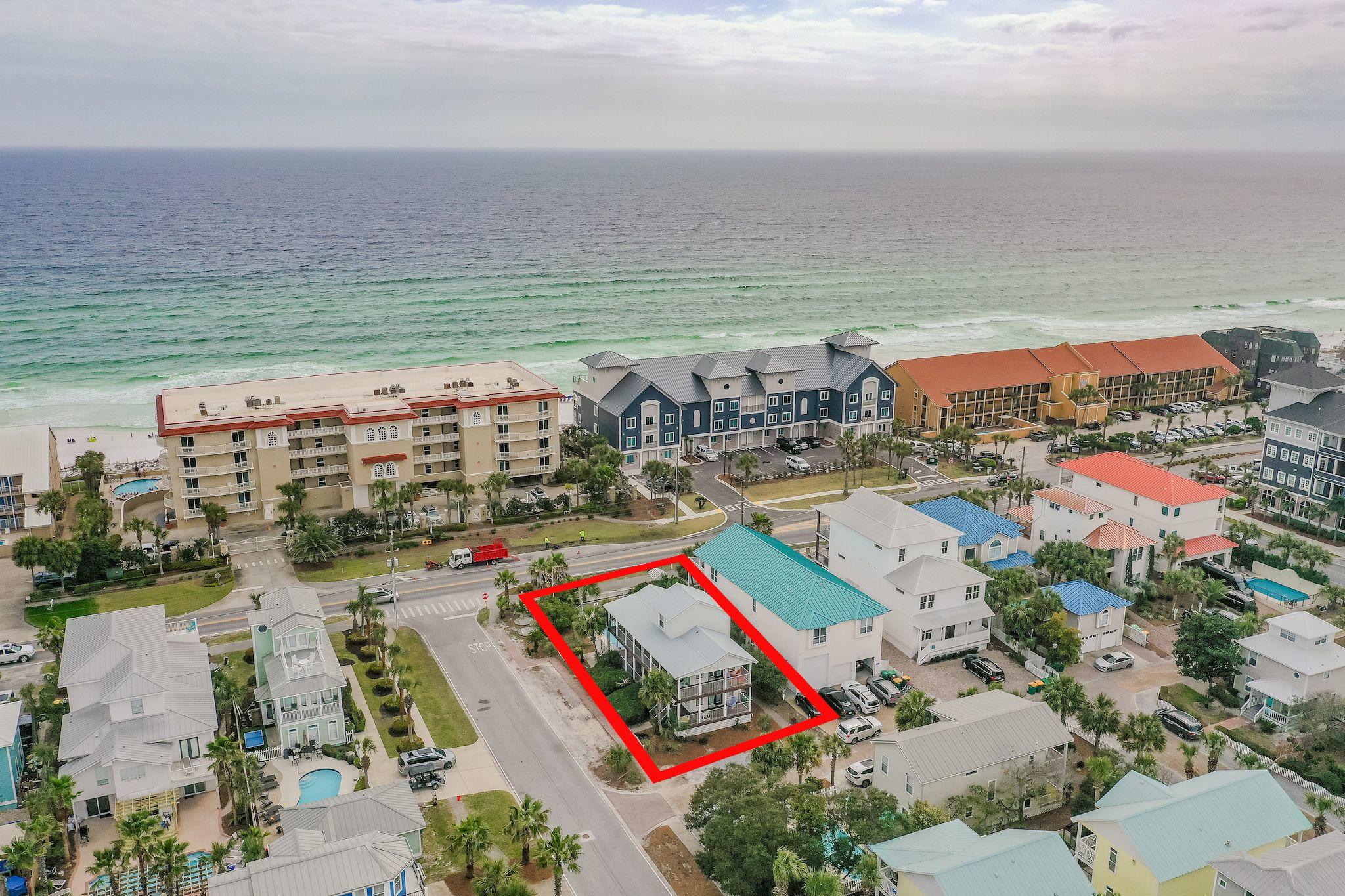 Location, Location, Location! 4 bedrooms, two master suites, 3 baths and a 15x30 heated pool! Furnished and ready to move in, located directly across the street from the beach. This home can sleep 12+ comfortably. The kitchen is open with tons of cupboard space, breakfast bar and granite counter tops. The great room has two newer sleeper sofas with french doors to the wrap around porch. Room for all to eat on the new table ,chairs and bar stools. Newly painted thru-out, crown molding, large rooms, a place for everyone. The wrap around porches are huge! Rock on your chairs, hear the gulf and smell the sea air! French doors on all levels brings you outside to your own private oasis. Extra parking...not a problem check out the gravel area on the side of this home....Plenty of room for several cars! Hurricane shutters on the windows will give you peace of mind, and the white beach and emerald waters just across the street will give you the piece of PARADISE you deserve!