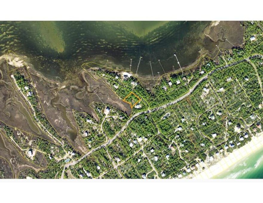 1 acre lot on marsh with potential views of the bay.  Perfect spot in The Plantation for your future home.