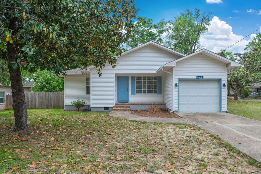 Welcome to 277 Okaloosa Avenue, a beautifully renovated 3-bedroom, 1-bath home situated on a spacious corner lot in the heart of Valparaiso. With fresh upgrades throughout and an unbeatable location just minutes from Eglin Air Force Base. Step inside to discover new luxury vinyl plank flooring throughout, creating a fresh feel and no sandy carpets. The kitchen has been completely refreshed with all-new cabinetry, appliances, and stunning quartz countertops. Additionally, the bathroom has been fully renewed with a tile walk-in shower, new vanity, and updated toilet. Highlights include an open-concept layout, separate dining area and breakfast nook, fresh interior paint, and updated lighting. Enjoy outdoor living on the covered porch overlooking the fully fenced backyard. Conveniently located by Lincoln Park and its public boat launch, and the local schools, this move-in-ready home is ideal for an easy move.