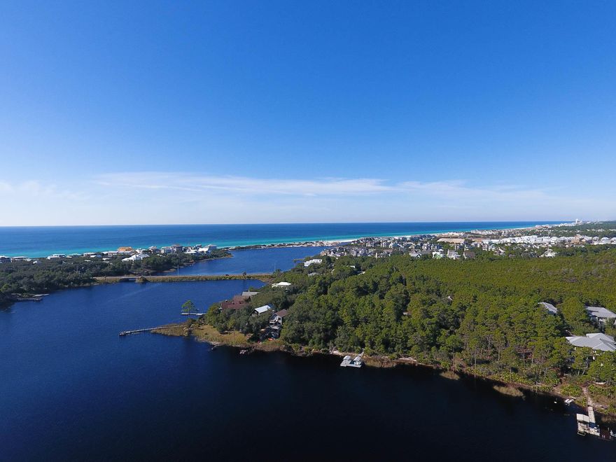 Incredible homesite located in the community of The Landing at Camp Creek. Future residence will enjoy breathtaking views of one of the rare coastal dune lakes, Camp Creek Lake. This gated neighborhood is bordered on two sides by state forest, offering one of the most serene settings found on 30A. Amenities include a private dock on the lake where residents can store their water toys. Paddle from the dock to experience incredible sunsets over the lake and gulf. Located just minutes from the sugar white sand and emerald waters of the Gulf of Mexico, this property makes for the perfect vacation getaway or permanent residence. Buyer to verify all dimensions.