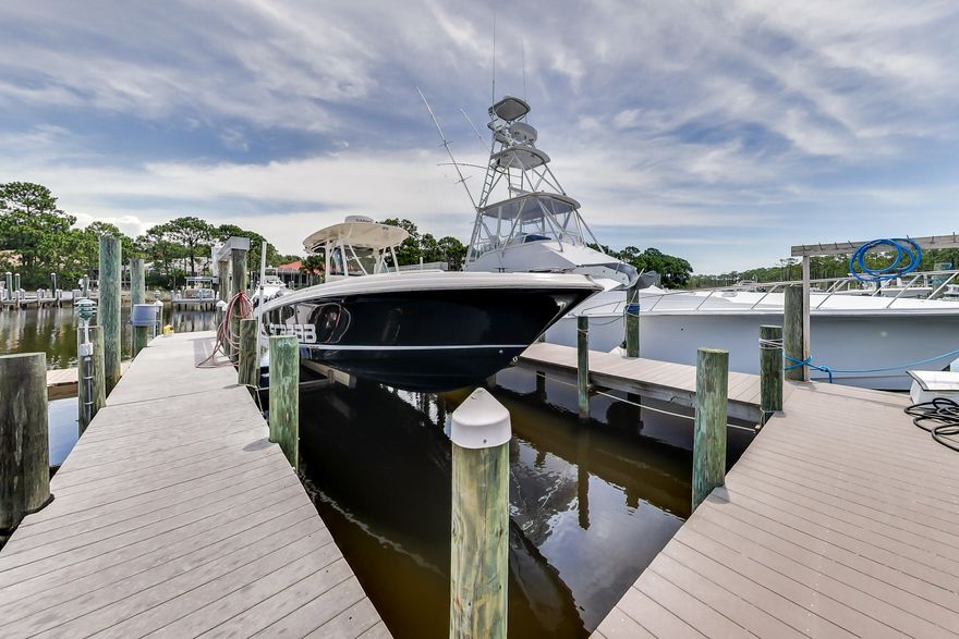 Property is Under Contract. Accepting Backup Offers. Enjoy Florida living at its finest on one of the rare lots in Destin that is truly deep water for yachts and sportfishing boats, and is also very well protected from most hurricanes. Seller had a 50ft sportfisherman bow-in at the slip in this location. The house had a new roof put on in 2016 and has several great upgrades throughout while still needing some additional cosmetic work.