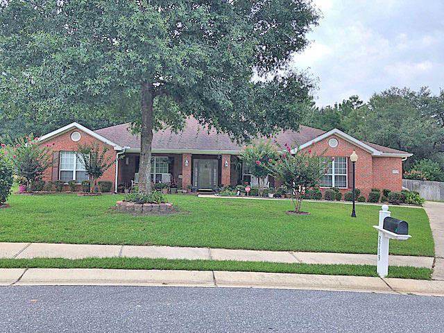 Gorgeous and immaculate 4Br, 3Ba, 2Cg house with just over 3,000 SF located on a Cul de Sac. Better than new! Custom wood blinds and drapes stay! Appliances remain. Yard of the month: 4 times! On a large (.8 acre) premium lot. Back yard backs up to the woods. Impressive interior as it was remodeled with new Oak wood floors, Tile, and top-grade carpet, Crown molding, custom bookshelves and a gas fireplace. Large kitchen with a Center island & Granite counters. Two separate walk-in closets in the Master BR. Enclosed Lanai. New AC unit. Gutters. Sprinkler system. Side garage is 22'x 21'. Swing set stays. Community pool & park. Please see attached list of amenities. Buyer to verify all measurements.