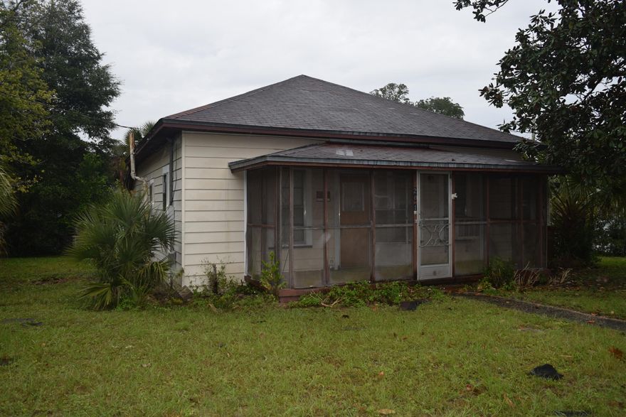 HIGHEST AND BEST USE FOR THIS PROPERTY COULD BE COMMERCIAL. IT IS CURRENTLY ZONED RESIDENTIAL. TWO STRUCTURES EXIST. DO NOT ENTER HOUSE ON THE LEFT - UNSAFE. BOTH PROPERTIES WERE BUILT IN THE MID-20'S. STRUCTURE ON THE RIGHT COULD BE HABITABLE WITH SOME TLC. THIS PROPERTY IS STRICTLY SOLD AS-IS, NO REPAIRS WILL BE DONE.