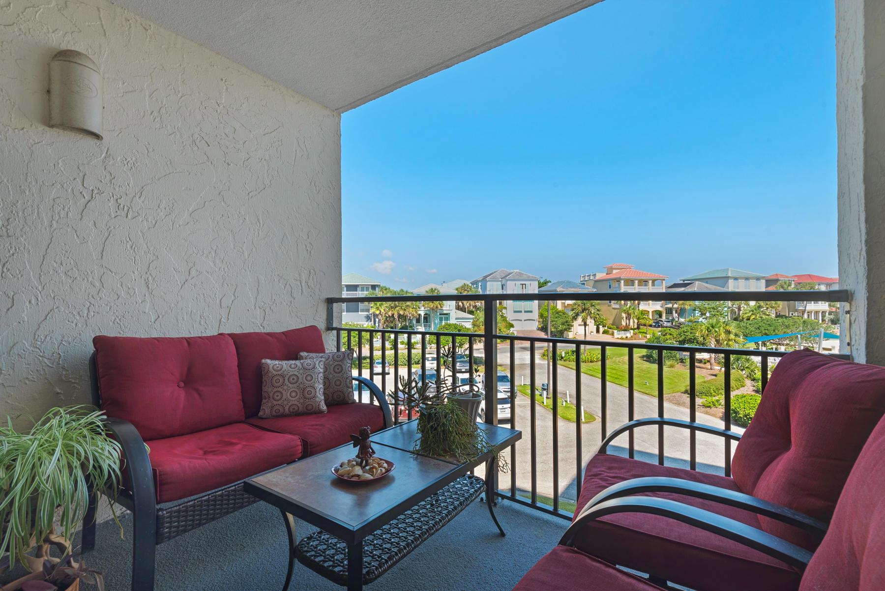 Under contract with Kick-out and 72 hours right of refusal. Amazing opportunity to own a condo on scenic 98 that is just steps from the beach and under 300k! Located along scenic 98 The Enclave is within walking distance to restaurants, shopping, and local bars. Recent improvements to the enclave include new roof, windows, paint, paver pool deck and more. There is deeded beach access, heated solar pool for the cooler months, basketball, tennis and sand volleyball courts, community room, owner parking garage, covered bike storage rack, separate storage. The Enclave is a well kept secret. Interior has been upgraded .Some owners live there full time; as they have generous storage.The owners have never rented the unit and have maintained it extremely well.
