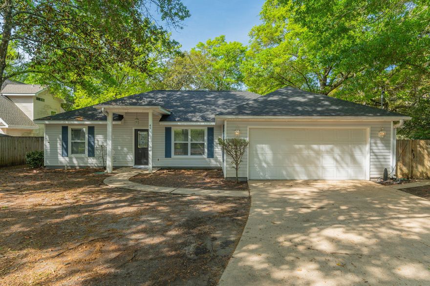 Move-in ready! This gem is perfectly located just minutes from Eglin AFB and Hurlburt Field, making daily commute a breeze. Whether you're moving in or relocating across town, this home checks every box. Step into the bright, open living space where hard floors and a large kitchen create an impressive, welcoming vibe. Love to cook? The massive kitchen is a storage dream, featuring stainless steel appliances, tons of cabinets, breakfast bar and expansive counters. The dining room boasts glass doors leading to your private patio and fully fenced large backyard. Main areas all have wood flooring. Bedrooms feature ceiling fans and carpet. The large backyard is fully fenced and level. Bonus storage building in the backyard as well as a full 2 car garage with auto opener.