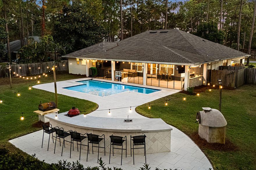 Over $85K+ in recent upgrades...PLUS a New Roof in 2024.  Live the 30A lifestyle at 442 Shipwreck Road W -- where coastal elegance meets everyday comfort. Lounge by your heated pool, grill in one of two outdoor kitchens, and unwind beneath swaying palms. Inside, nearly 3,000 sq ft of light-filled space flows effortlessly from a gourmet kitchen to open living and dining areas. The spa-style primary suite, marble finishes, and designer details elevate every moment. Minutes from the beaches, dining, and boutiques of 30A, this is Santa Rosa Beach living at its best -- relaxed, refined, and built for entertaining. *All listing information is deemed reliable but not guaranteed. Buyer and buyer's agent to verify all details, including dimensions, square footage, HOA fees, and property information to their own satisfaction.