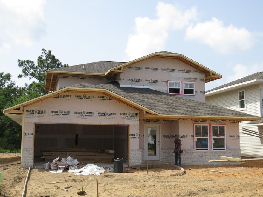 Welcome to Hooper Drive Subdivision, a new 6 lot development in west Fort Walton Beach. Brand new construction started on 5/01/2014. Awesome plan offered by an winning builder and 2014 Parade of Homes multiple award winner! This 2 Story (master is on first floor), 3/3.5 home has super curb appeal. There are 9 ft. ceilings w/ impressive crown molding, and 5 1/4'' baseboard throughout the main living areas and master. As you approach the front of the home, you will be quite impressed. The covered porch is very welcoming, and the attractive leaded glass door makes for a grand entrance. The formal dining room is at the right of the home's front. As you continue down the hallway, just past the stairwell, you will then enter the chef's delight kitchen which boasts maple cabinetry,